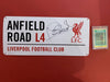 LIVERPOOL - PHIL NEAL - SIGNERT ANFIELD ROAD SKILT MED EKTEHETSBEVIS/COA